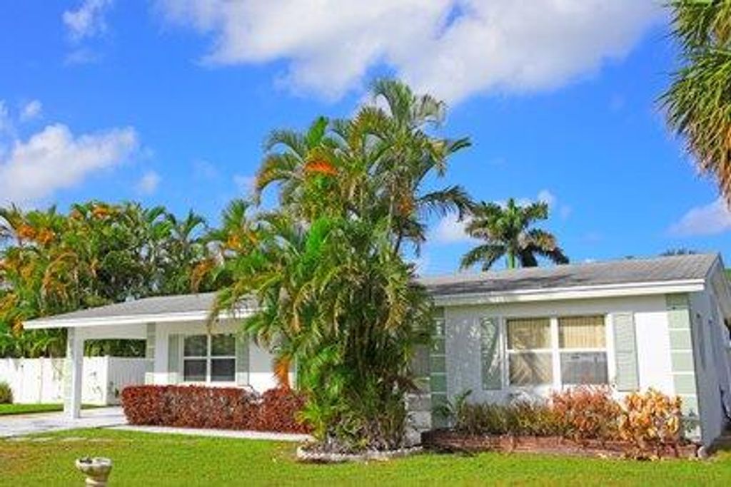 Photo of 643 Australian Circle, Lake Park, FL 33403 (MLS # R10918433)