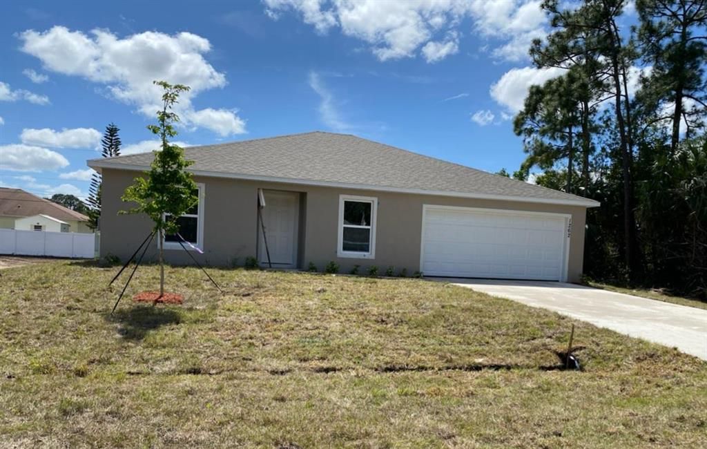 Photo of 1262 SW Granville Avenue, Port Saint Lucie, FL 34953 (MLS # R10704010)
