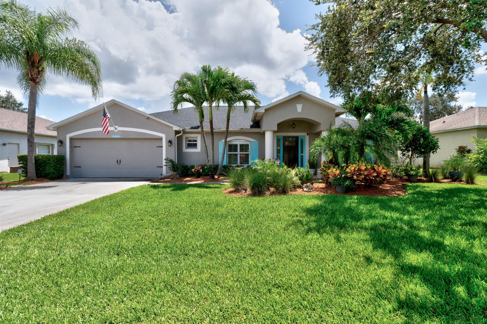 EXPERIENCE PARADISE in this updated, move-in ready 3/2/2 POOL home. Granite/Quartz kitchen w/ wood cabinets & dovetail drawers, plantation shutters, wood-like tile floors, updated baths, split plan, high ceilings, beautiful French Silver Gem coat saltwater/heated pool w/ a tropical, private yard....this one has it all. New HVAC (2024), New roof (2022), new H2O heater (2023), fridge (2020), full set hurricane shutters, fully fenced, fresh paint, custom landscaping, full irrigation system on separate well, county water/sewer, open great room design and low HOA fees. Hurry this one will not last!