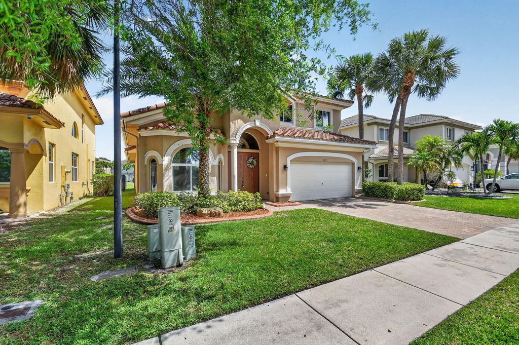Photo of 9157 Citrus Isle Lane, Lake Worth, FL 33467 (MLS # B26017339)