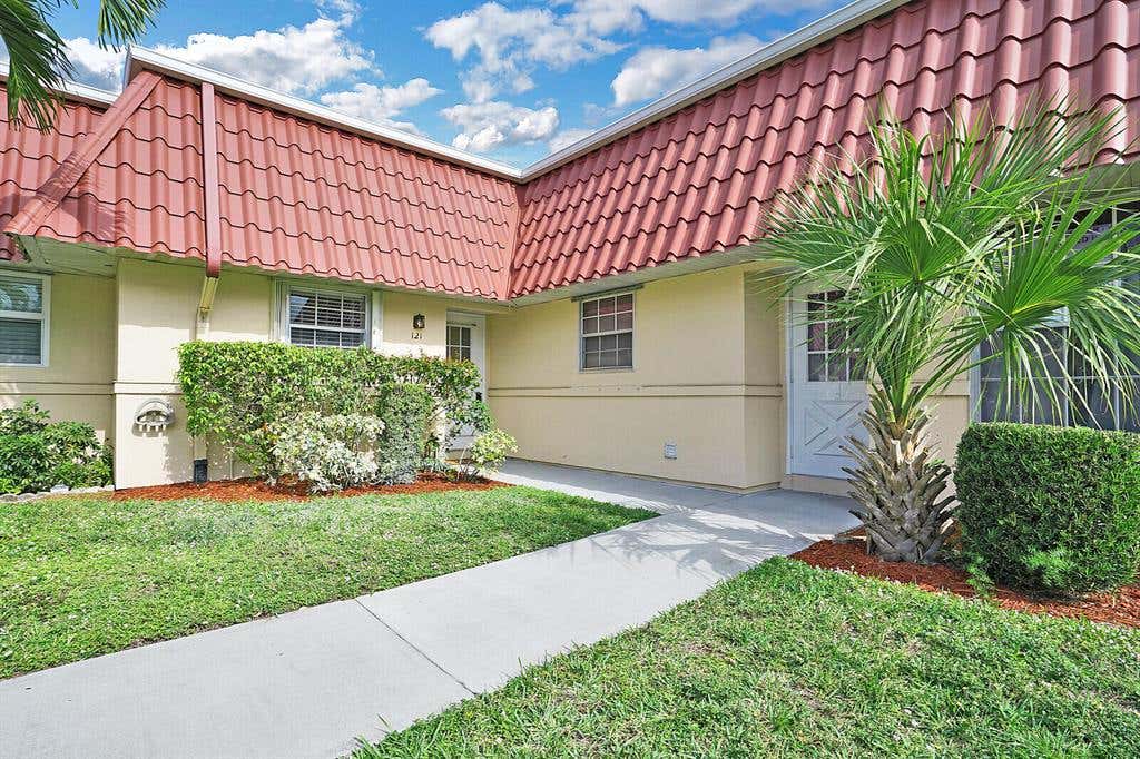 Photo of 121 Amherst Lane Ln, Lake Worth Beach, FL 33467 (MLS # R10767367)