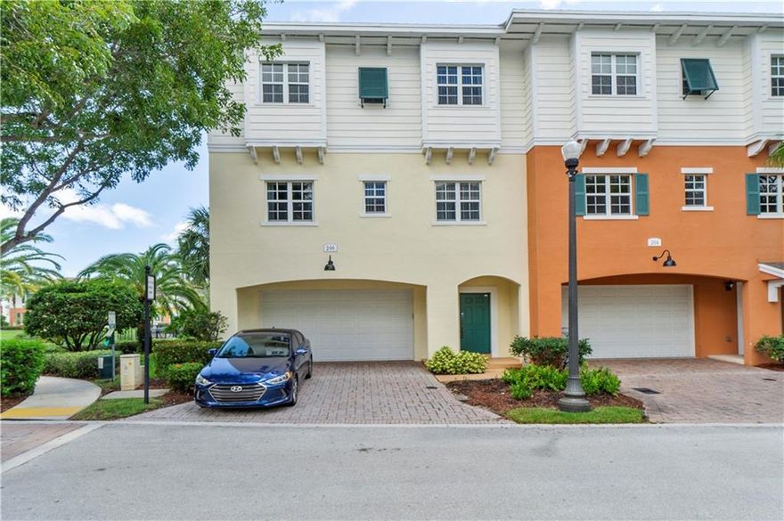 Beautiful lake view tri-level townhome in the desirable Orchid Grove. Home offers 4 bedroom, 2 full bath and 2 half bath, tile and laminate floors on the main living area and carpet in the bedrooms. On the 1st level there is a 1 bedroom and half bathroom, on the 2nd level an open kitchen with granite countertops, stainless steel appliances and pantry. Living room and dining room and a den that can be used as an office or family room, balcony overlooking the lake and half a bath. On the third floor is the laundry room with side by side washer and dryer, 3 bedrooms and 2 bathrooms. The master bedroom offers 2 walk in closets, huge master bathroom with tub and separate shower and  his and hers sink. DON'T MISS THIS GREAT OPPORTUNITY!!! home with 2 car garage and impact windows throughout.