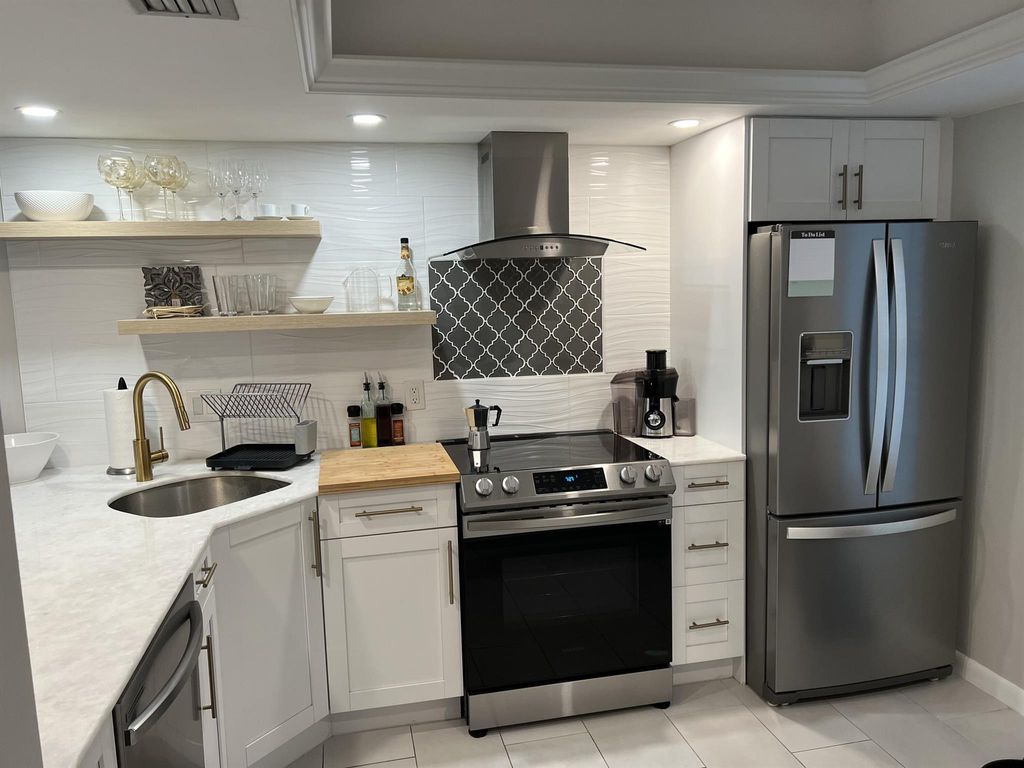 Photo of 18420 SE Wood Haven Lane #E, Tequesta, FL 33469 (MLS # R10927630)