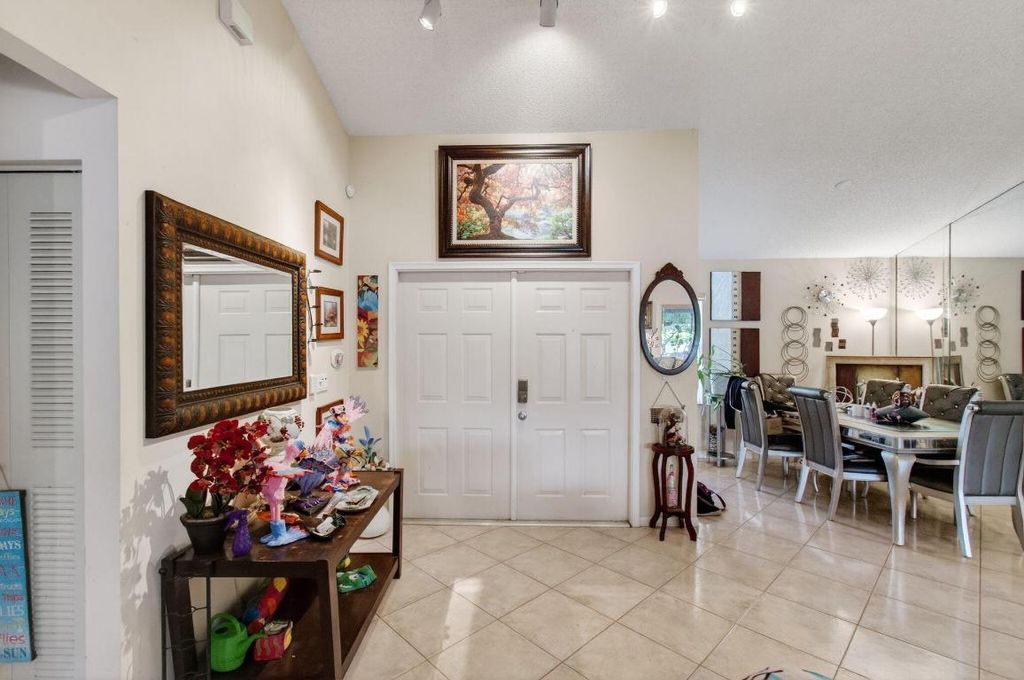 Photo of 9303 Sun Pointe Drive, Boynton Beach, FL 33437 (MLS # R11145607)