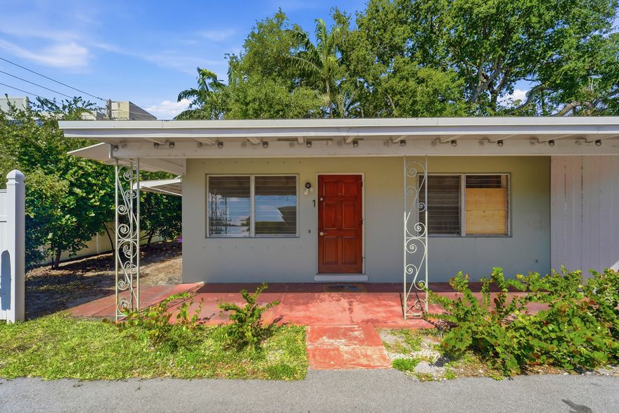 This duplex features two 1-bedroom units, totaling 1,459 sq ft. It's conveniently located not far from the beach and urban amenities like Whole Foods, Publix, CVS, TJ Maxx, Ace Hardware, various restaurants, such as Southport Raw Bar, Kellys Landing, Outback, Kubo Asian, Mezzaluna, Taco Bell, Pollo Tropical, The Boatyard, Siam House, Gilberts, La Bamba & Dunkin Donuts. The airport, public transport, and parks are also close by. The property has a newer roof (2021) but requires cosmetic updates and a few window fixes in the front unit (the rear has impact windows). There is also an attached storage room. A great opportunity for vacation or long-term rentals, with plenty of parking available for RVs or boats and toys. Zoned RMM-25 (Res Med high) in flood zone AH. Being sold AS-IS!