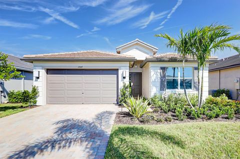 Photo of 13549 SW Oceanus Boulevard, Port Saint Lucie, FL 34987 (MLS # R11143626)