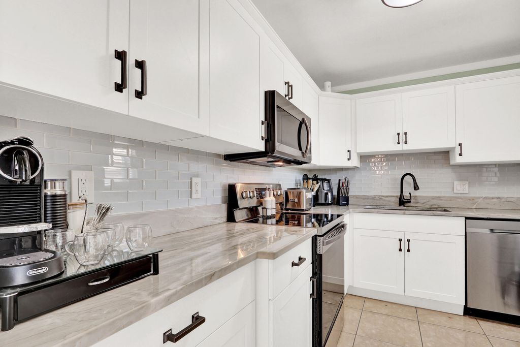 Photo of 502 Davis Road #12, Palm Springs, FL 33461 (MLS # B26007819)