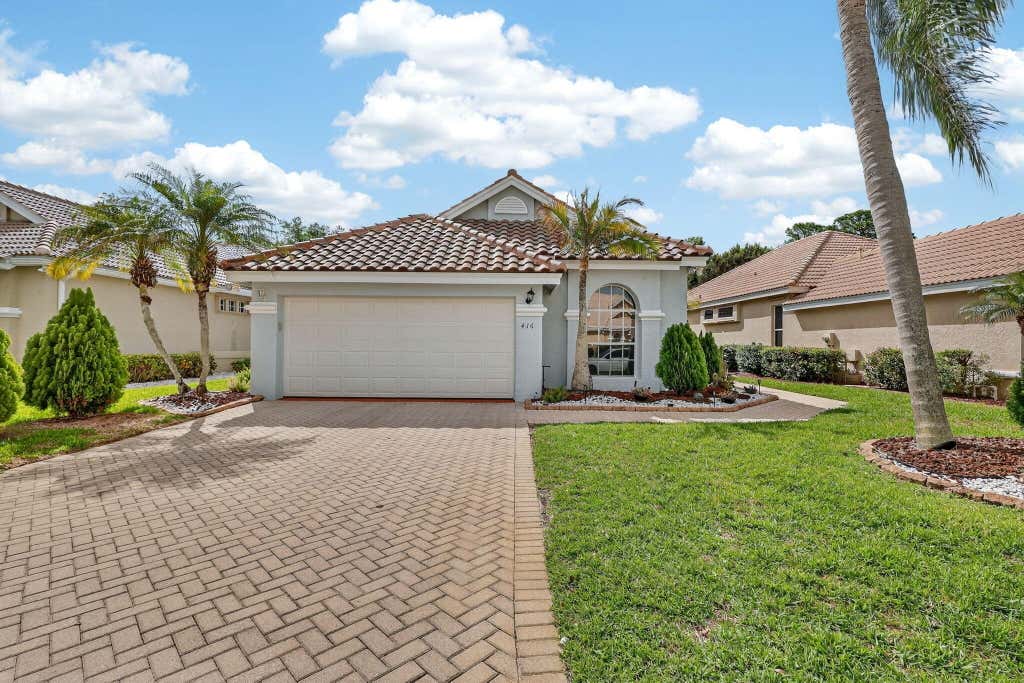 Photo of 416 SW Horseshoe Bay, Port Saint Lucie, FL 34986 (MLS # B26051062)