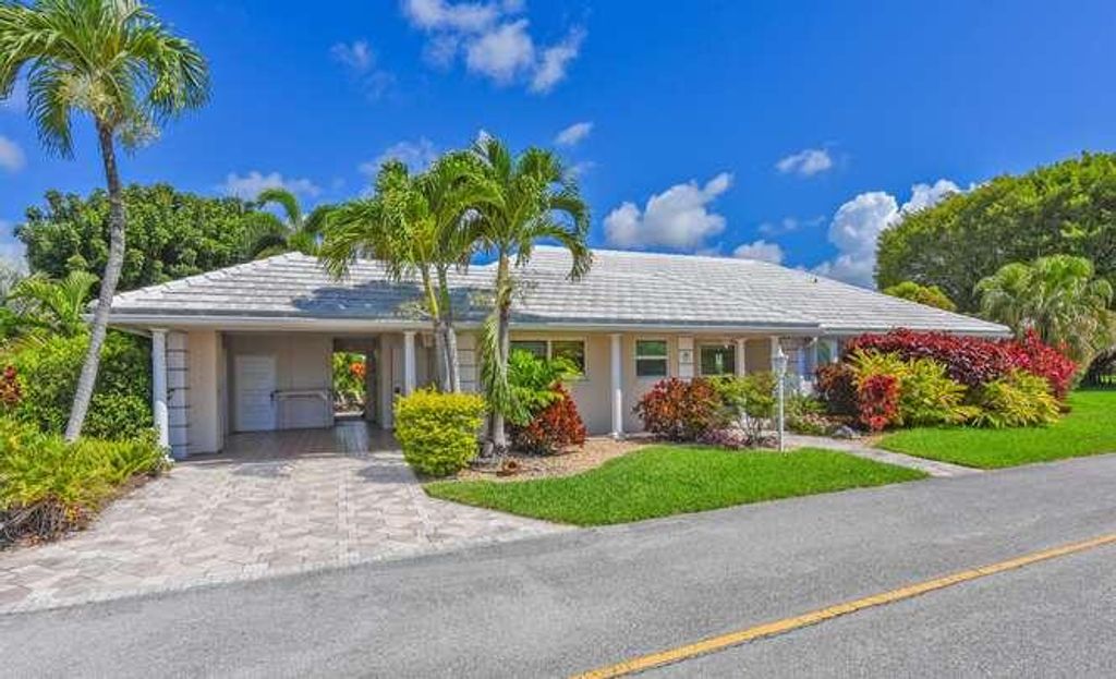 Photo of 437 French Royale Circle, Atlantis, FL 33462 (MLS # B26031880)