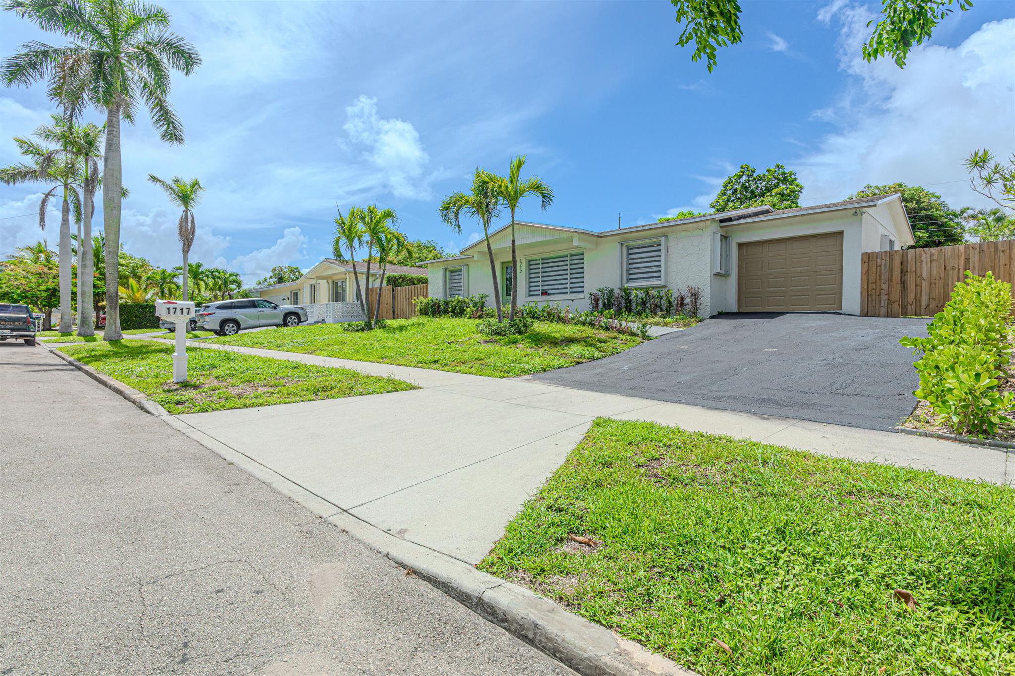 Step into this stunning 3-bedroom, 2-bathroom home, completely remodeled with exceptional taste and attention to detail. From the moment you walk in, you'll be welcomed by a bright, modern space featuring high-end finishes that perfectly blend style and comfort. The kitchen and bathrooms have been fully updated with contemporary design and quality craftsmanship. A brand-new roof provides peace of mind and long-term value.The spacious backyard is a tropical paradise, complete with fruit trees--perfect for relaxing, entertaining, or enjoying your own fresh harvest.Located in a vibrant neighborhood filled with amenities, including parks, , and recreational areas ideal for walking, exercising, or spending time with family. Just minutes from the beach, this home offers the perfect lifestyle.