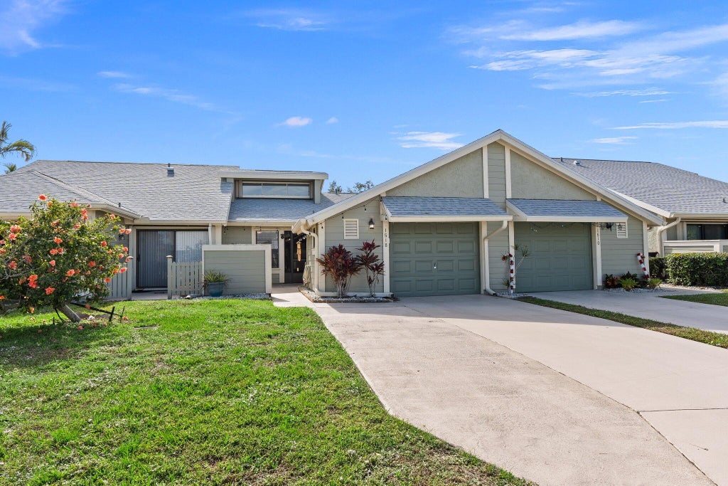 Photo of 1518 SE Dewberry Court, Port Saint Lucie, FL 34952 (MLS # R11049421)