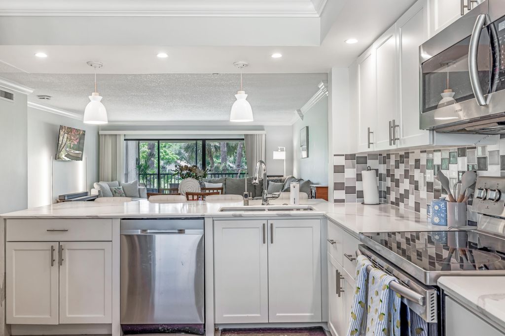 Photo of 12926 Briarlake Drive #201, Palm Beach Gardens, FL 33418 (MLS # R11079735)