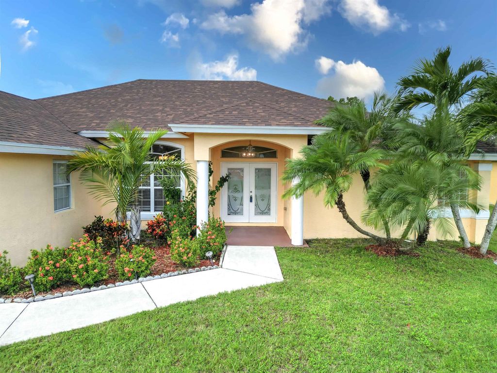 Photo of 3658 SW Carmody Street E, Port Saint Lucie, FL 34953 (MLS # R10924630)