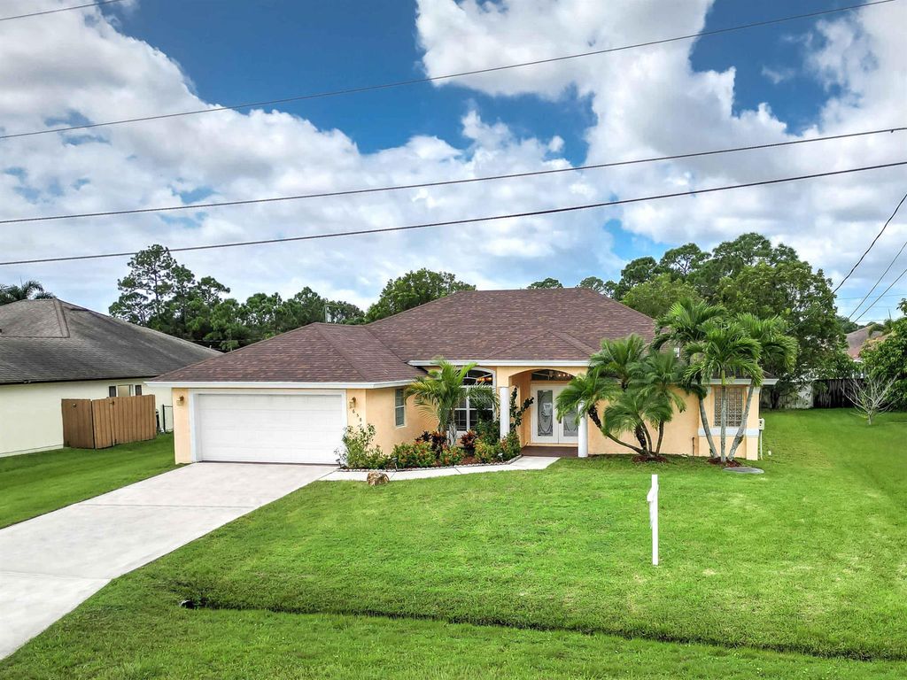 Photo of 3658 SW Carmody Street E, Port Saint Lucie, FL 34953 (MLS # R10924630)