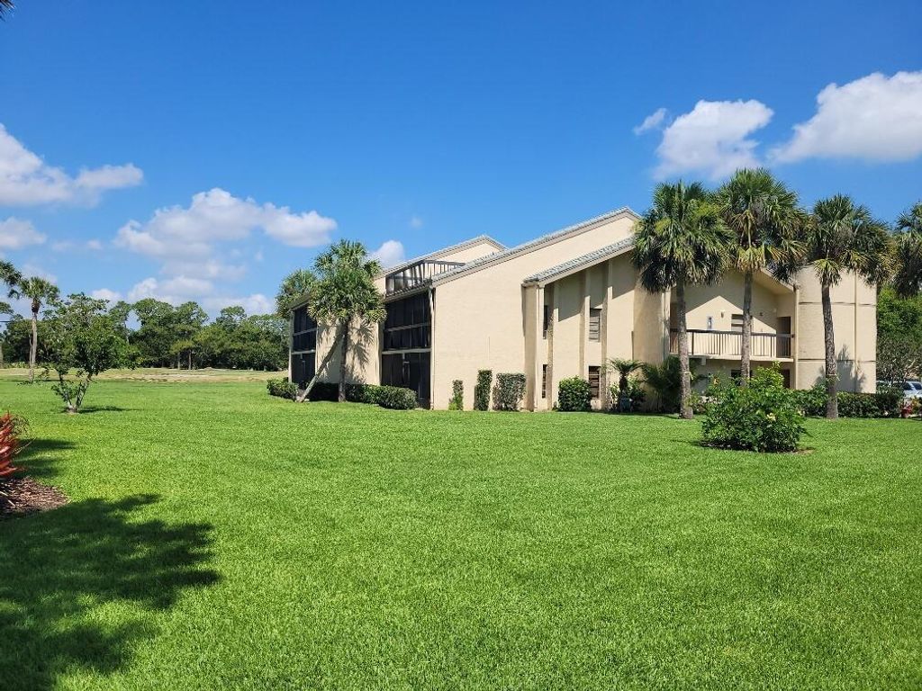 Photo of 9440 Meadowood 105 Drive #105, Fort Pierce, FL 34950 (MLS # R10900225)
