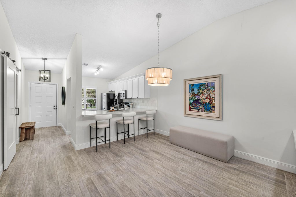 Photo of 1401 Sabal Ridge Circle #F, Palm Beach Gardens, FL 33418 (MLS # B26093647)