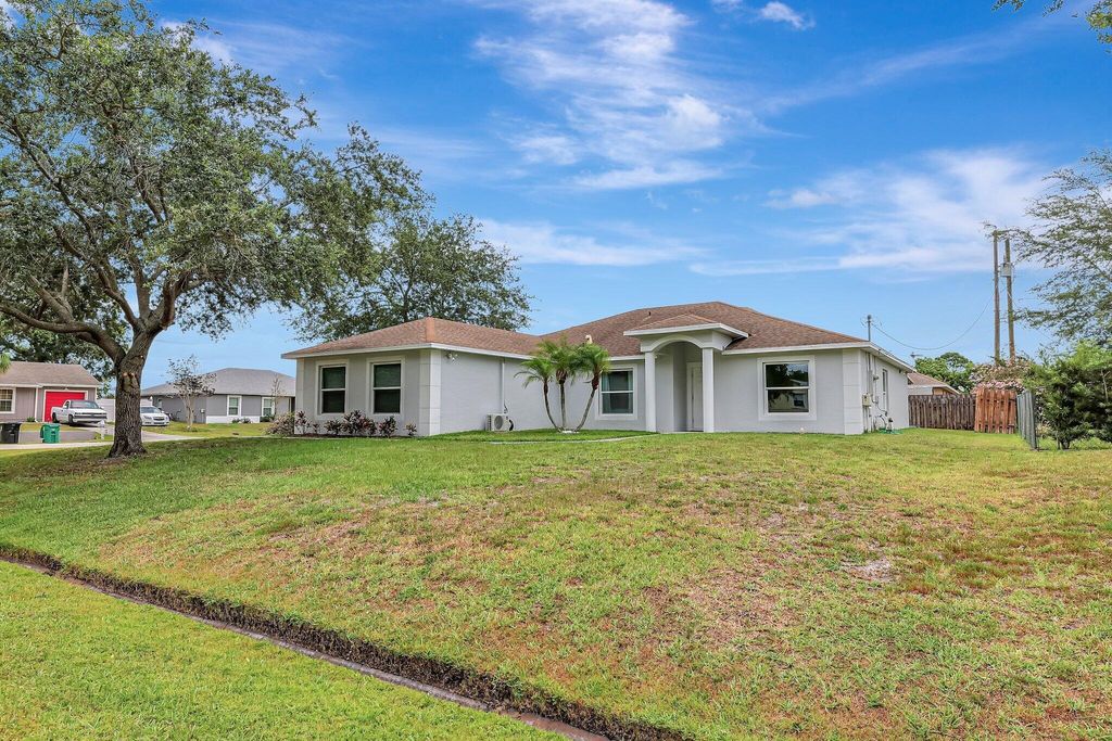Photo of 1901 SW Aguero Street, Port Saint Lucie, FL 34953 (MLS # R10995903)