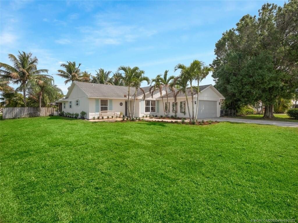 Photo of 1999 NE San Carlos Calle, Jensen Beach, FL 34957 (MLS # R11021994)