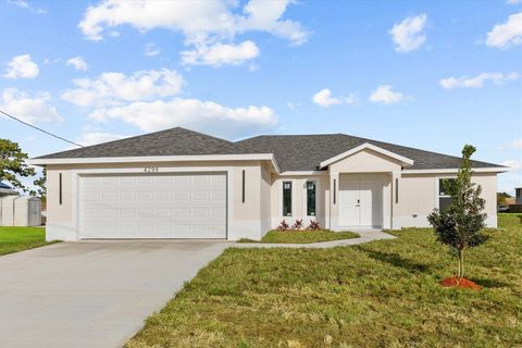 Photo of 4299 SW Hagaplan Street, Port Saint Lucie, FL 34953 (MLS # B26011252)