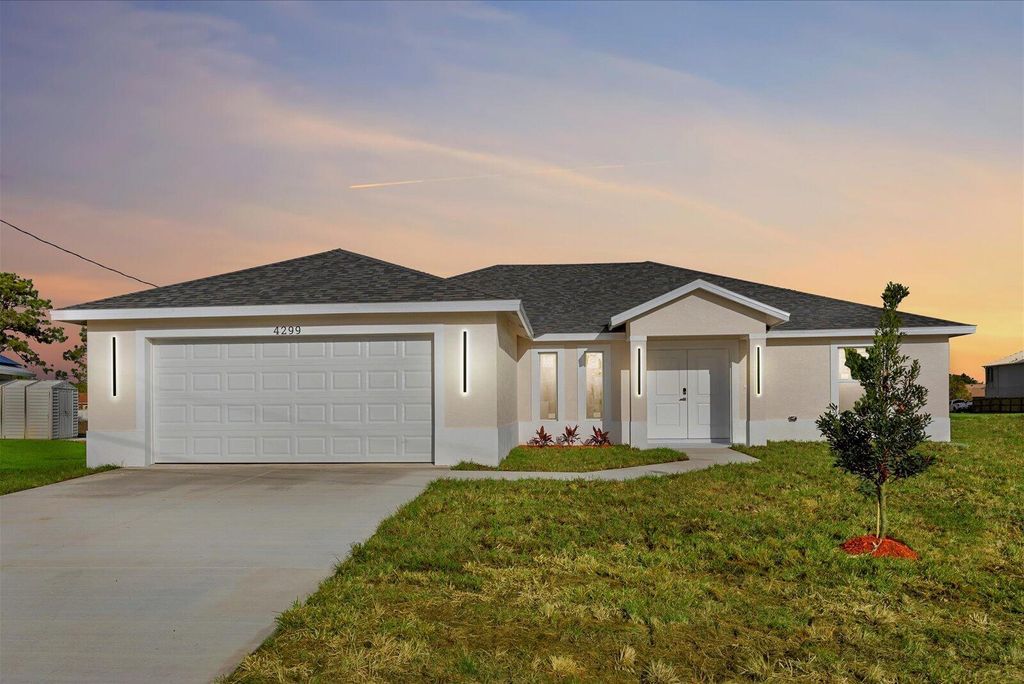 Photo of 4299 SW Hagaplan Street, Port Saint Lucie, FL 34953 (MLS # B26011252)