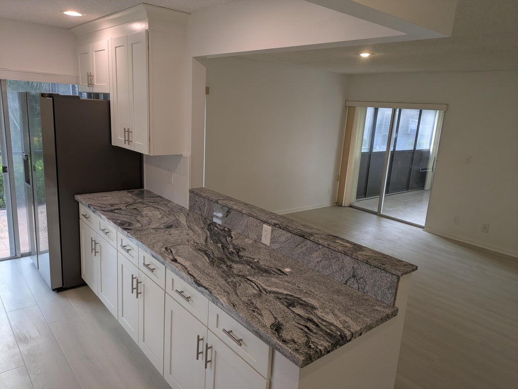 Photo of 8861 Echo Lane, Boca Raton, FL 33496 (MLS # B26075527)