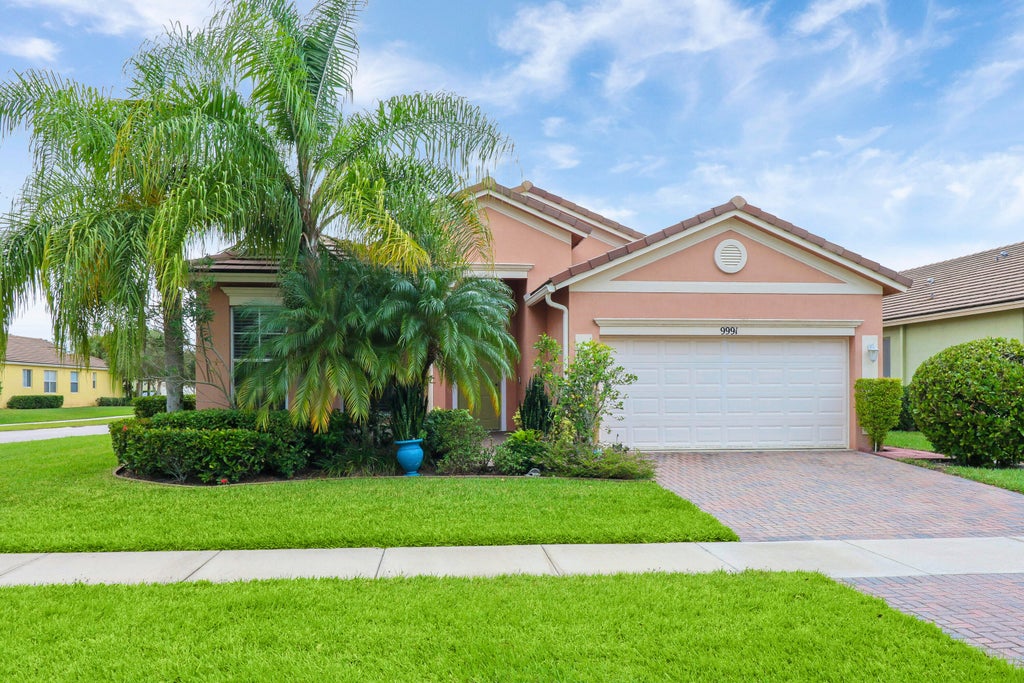 Photo of 9991 SW Glenbrook Drive, Port Saint Lucie, FL 34987 (MLS # R10937388)