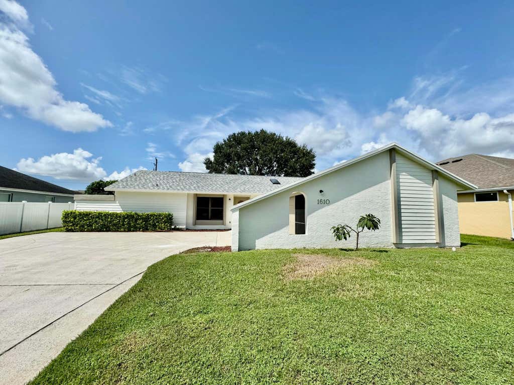 Photo of 1610 SW Hampshire Lane, Port Saint Lucie, FL 34953 (MLS # R11020867)