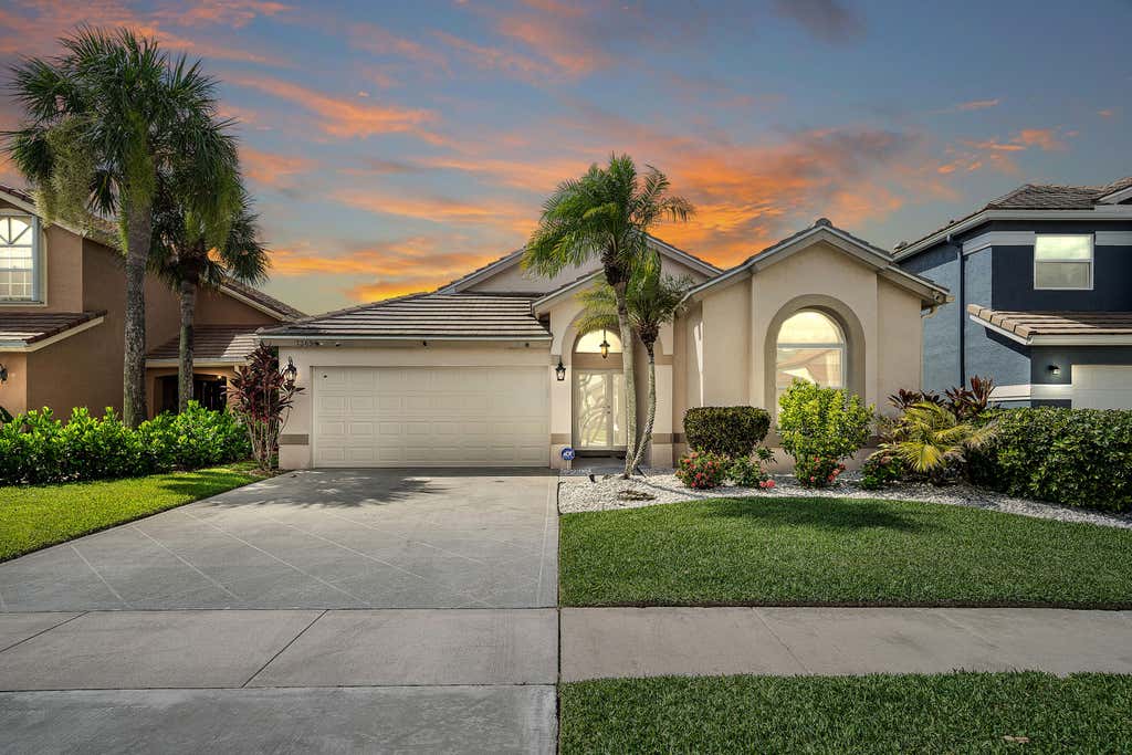 Photo of 7369 Ashley Shores Circle, Lake Worth, FL 33467 (MLS # B26060690)