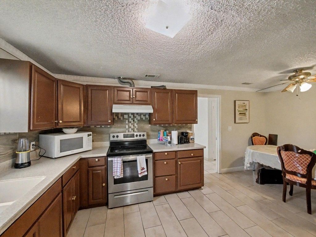 Photo of 5043 Marcia Place, West Palm Beach, FL 33407 (MLS # F10545054)