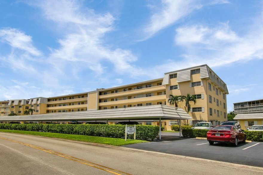 Very desirable bottom floor condo with views of the water, golf course, and pool. Two bedrooms and two full bathrooms, large screened porch and assigned parking right out your front door. Master suite boasts a large walk-in closet and plenty of additional storage. This condo is ready for someone to make it Florida living at its finest. Available now and furnishings are negotiable. Move-in ready and great location on Lost City Golf Club in the City of Atlantis. The City of Atlantis is a private gated community offering two outstanding golf clubs, tennis courts, Kintz Park, and it's own City Council and Police Department. Located adjacent to JFK Hospital, and minutes away from downtown West Palm Beach, Lake Worth, the beach and PBI Airport.