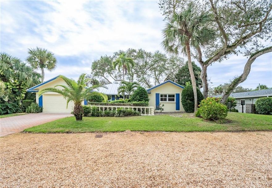 Available Now! Beautifully landscaped, absolutely immaculate -- completely remodeled -- newer kitchen and baths, newer appliances, hurricane grade windows and newer roof, large living room, dining area and completely redone kitchen. Enclosed back porch looks to partially fenced rear yard. Located in sought after central beach -- near to shops, stores, and beach. 2 car garage.