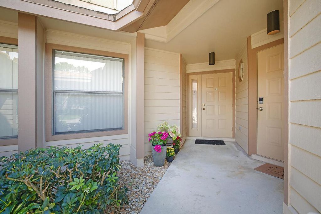 Photo of 300 Crosswinds Drive #D1, Greenacres, FL 33413 (MLS # R11082076)