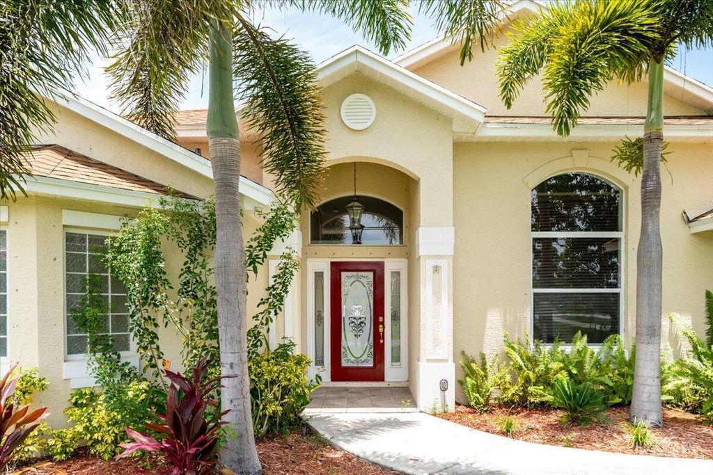 Photo of 2402 SW Velarde Street, Port Saint Lucie, FL 34953 (MLS # R10947925)