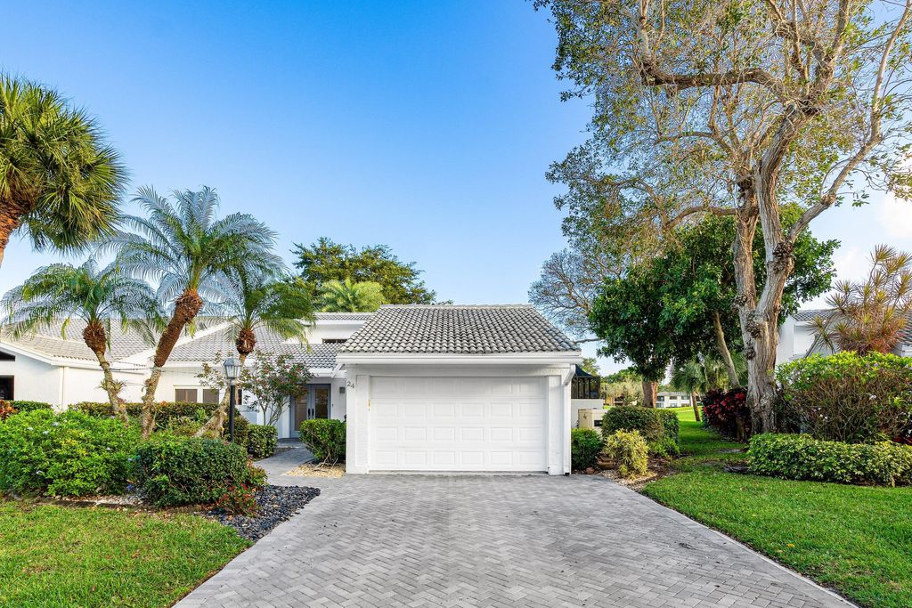 Photo of 24 Cambridge Drive, Boynton Beach, FL 33436 (MLS # R11169641)