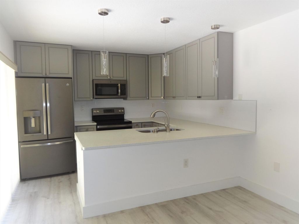 Photo of 3068 30th Court, Jupiter, FL 33477 (MLS # R11026813)