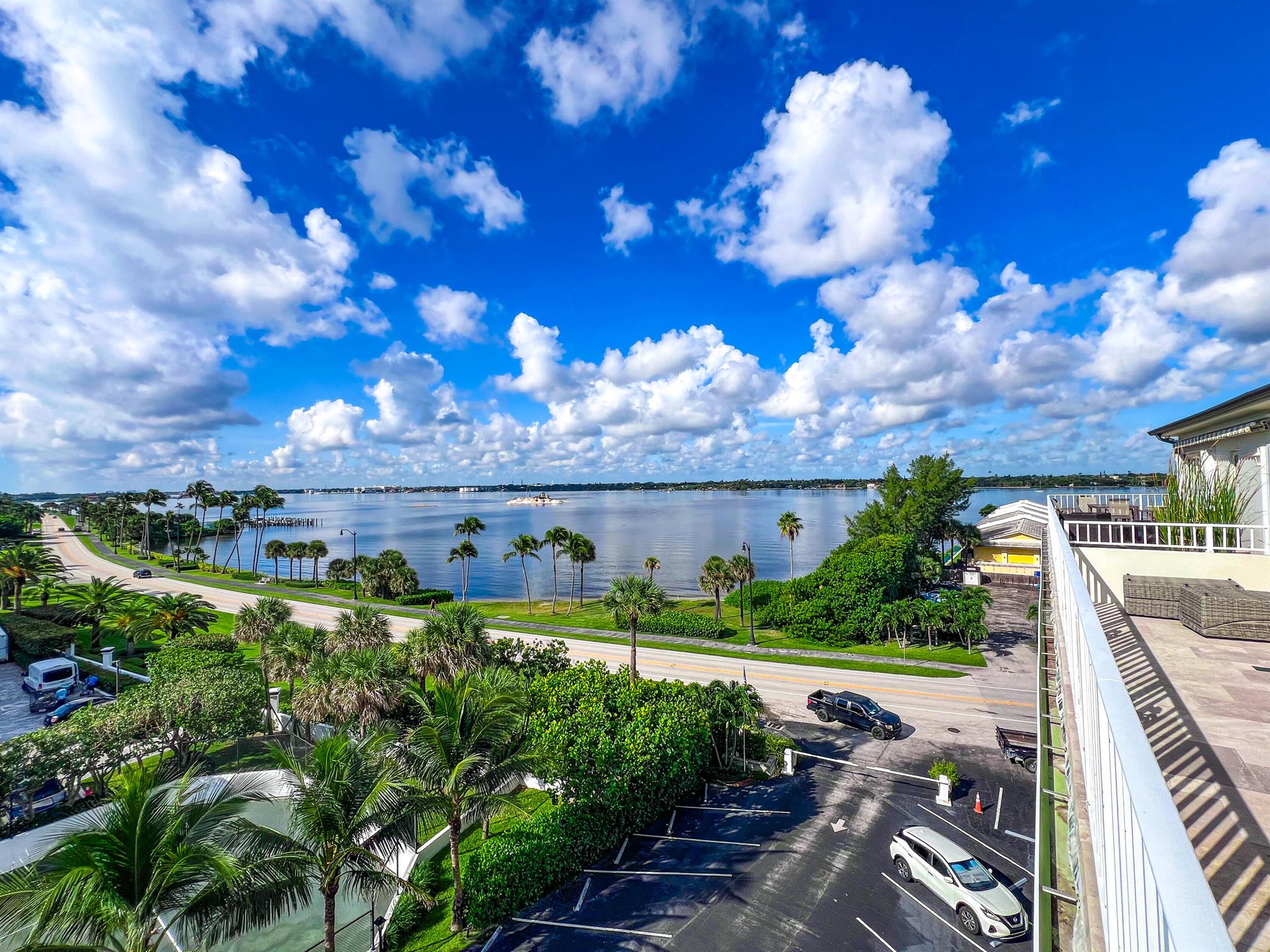 This amazing condo with ocean AND lake views is available for seasonal turnkey rental (or longer). Fully renovated, this charming 2 bedroom condo is located in The Palmbeacher building, a small quiet, gated condo building just 2 buildings south of Lake Worth Bridge and on the beach! Very deep, spacious, furnished south facing balcony with tumbled travertine tiles. Queen four poster bed in primary bedroom. New Murphy Bed in 2nd bedroom (photos coming soon). Community pool, BBQ ocean lawn and private beach area. DirectTV provided with Vizio sound bar. Dedicated parking spots. 2 bikes included so you can enjoy the best that Palm Beach has to offer! Steps away from Benny's on the Beach. 4 month minimum. Video available upon request.
