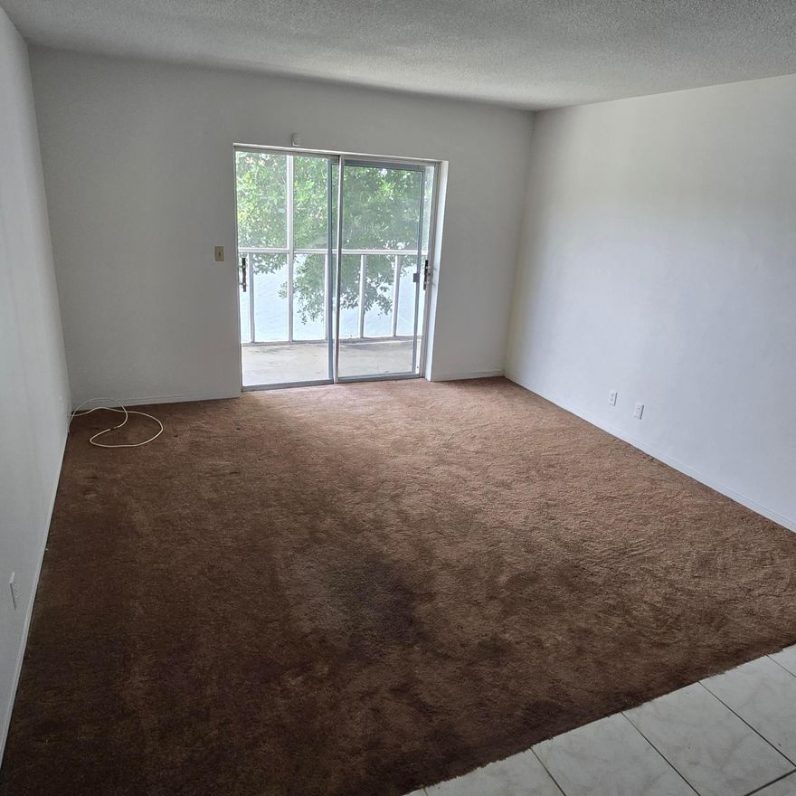 Welcome to this 2-bedroom, 2-bathroom condo featuring breathtaking water views from the second floor. The spacious, light-filled living room is perfect for relaxing or entertaining, while building amenities, including an elevator and on-site laundry.