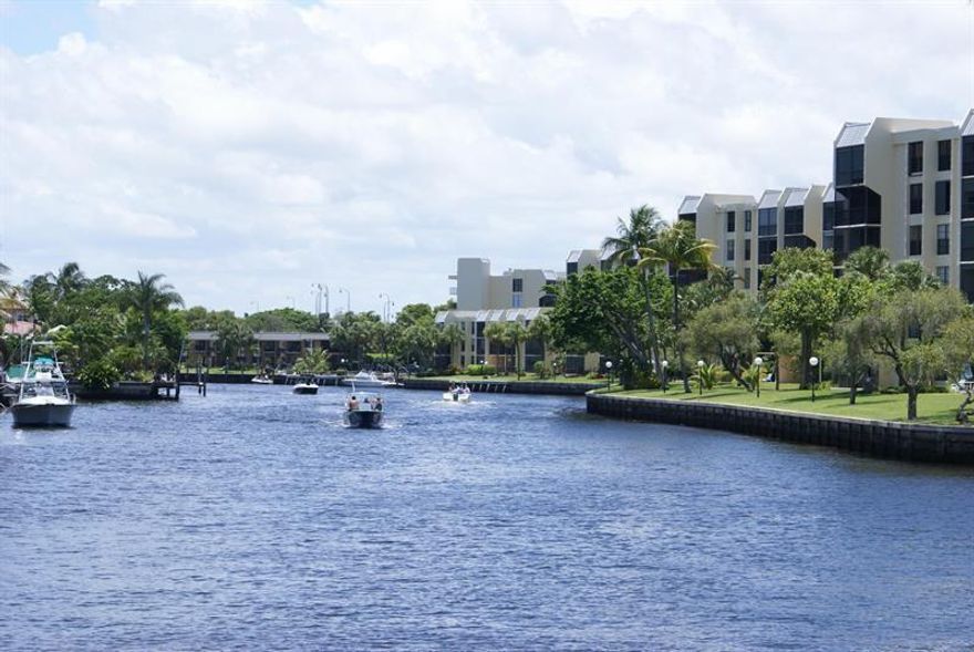 SELLER WILL PAY ASSESSMENT IN FULL AT CLOSING.   Updated  2 BED/2 bath waterfront condo within the beautiful City of Boca Raton. 24/7 Guard gated community.  Washer and dryer located in the unit for your convenience. Community offers tennis courts, heated pool and gym. OCEAN ACCESS. MINUTES TO BEACHES, FINE DINING, BOCA TOWN CENTER AND ENTERTAINMENT.  TURN KEY PROPERTY . NO MOTORCYCLES, NO TRUCKS AND NO RV'S ALLOWED.