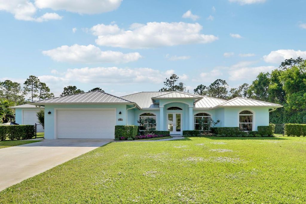 Photo of 13148 158th Street N, Jupiter, FL 33478 (MLS # R11145692)