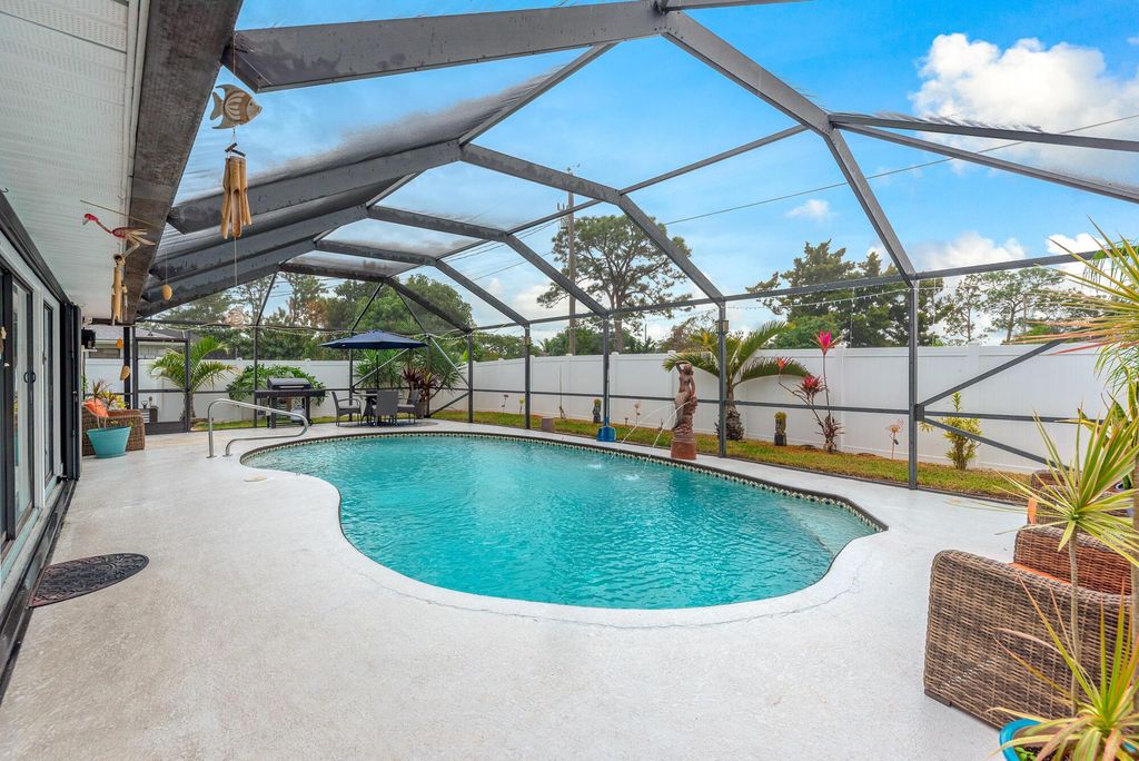 Photo of 764 SE Evergreen Terrace, Port Saint Lucie, FL 34953 (MLS # R10946739)