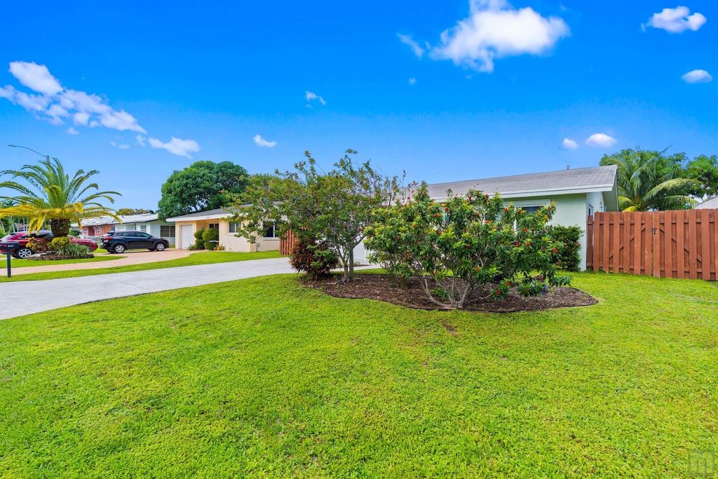 Photo of 3161 NW 65th Dr, Fort Lauderdale, FL 33309 (MLS # F10531603)