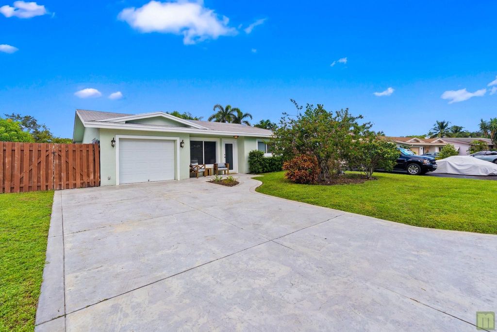 Photo of 3161 NW 65th Dr, Fort Lauderdale, FL 33309 (MLS # F10531603)