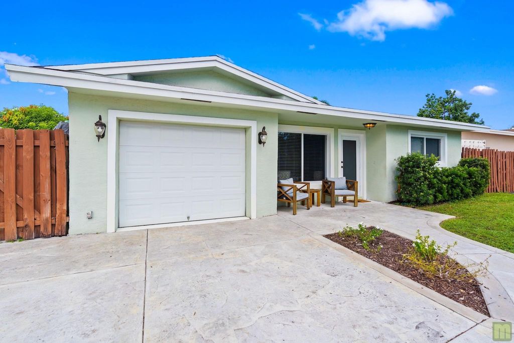 Photo of 3161 NW 65th Dr, Fort Lauderdale, FL 33309 (MLS # F10531603)