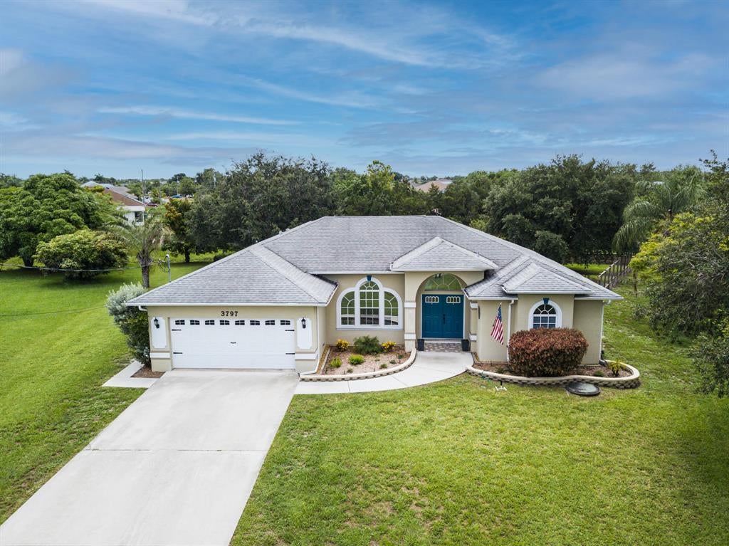 Photo of 3797 SW Jack Street, Port Saint Lucie, FL 34953 (MLS # R10728621)