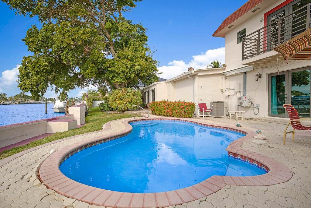 Photo of 1901 N Riverside Drive, Pompano Beach, FL 33062 (MLS # R11148546)