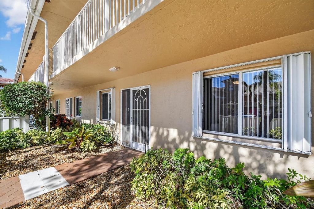 Photo of 5951 Regal Glen Drive #107, Boynton Beach, FL 33437 (MLS # R11156984)