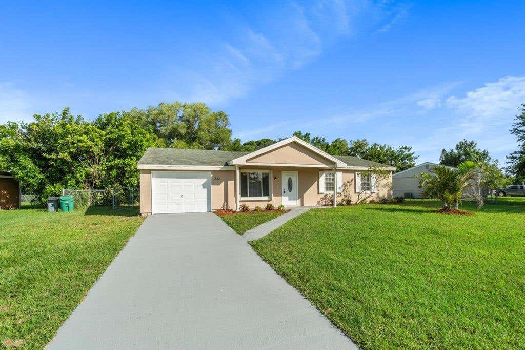 Photo of 232 SW Kimball Circle Cir, Port St Lucie, FL 34953 (MLS # R10734185)
