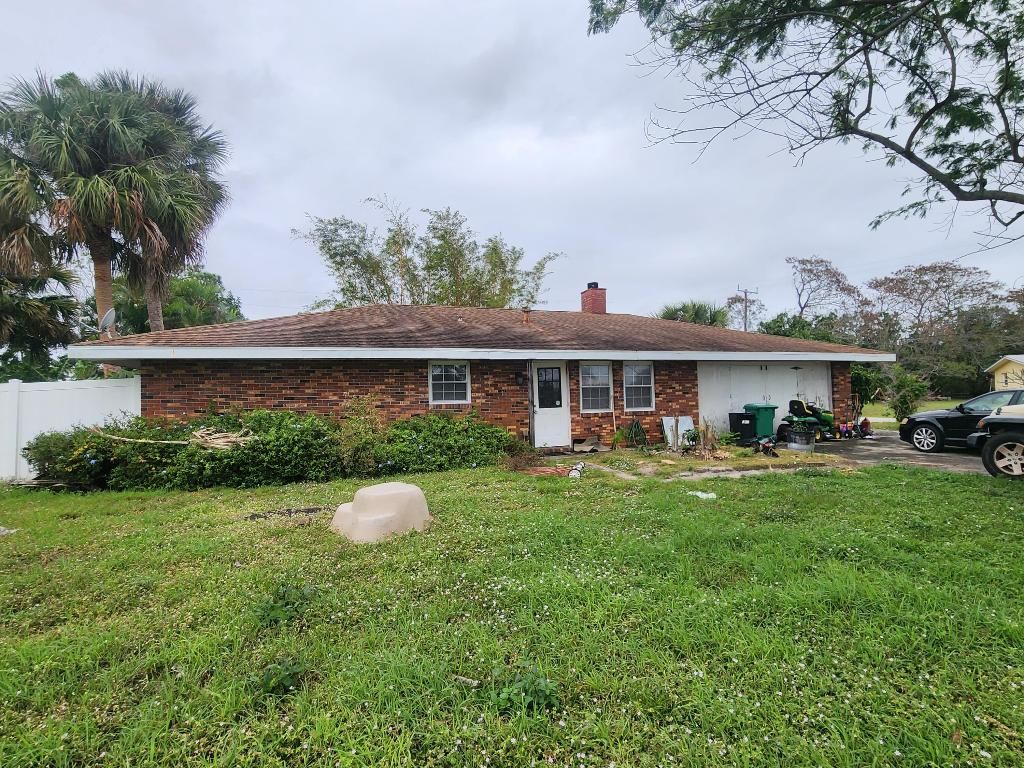 Photo of 120 SE Caprona Avenue, Port Saint Lucie, FL 34983 (MLS # R10958538)