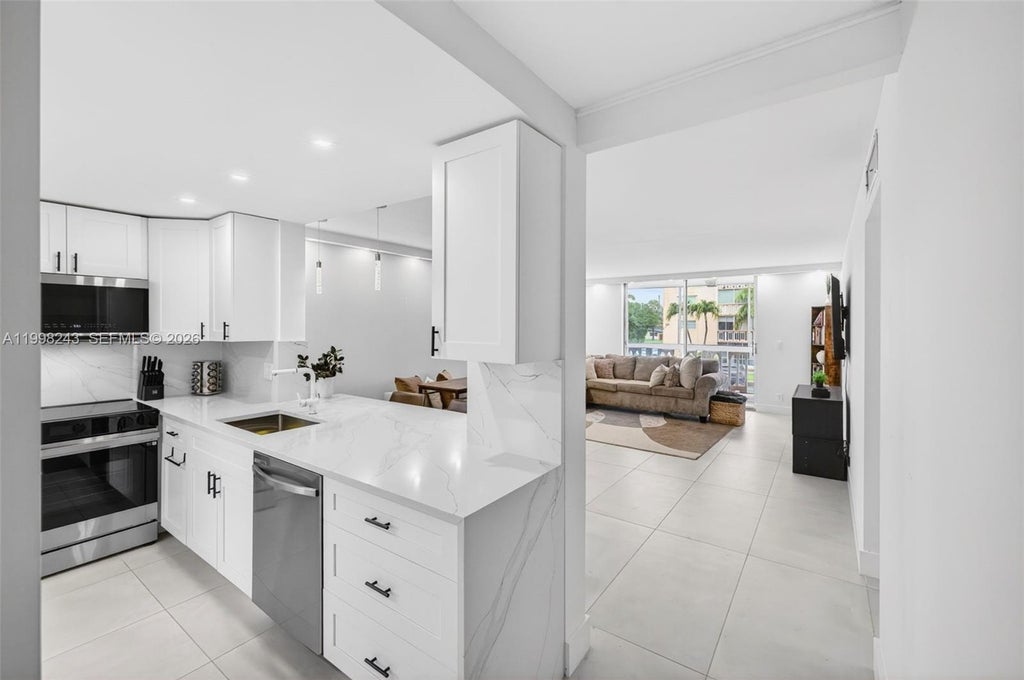 Photo of 420 NE 12th Avenue #202, Hallandale Beach, FL 33009 (MLS # A11998243)
