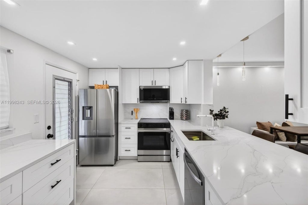 Photo of 420 NE 12th Avenue #202, Hallandale Beach, FL 33009 (MLS # A11998243)